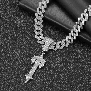Iced out sword pendant with silver Cuban link chain featuring shiny rhinestones