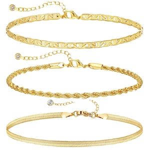 Gold layered chain bracelet set with H-link, twisted cable, and sleek snake chain designs