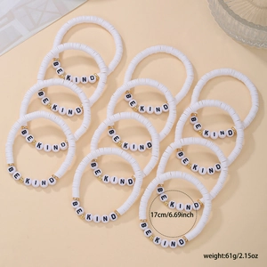 Set of 12 white clay bead elastic bracelets with gold accents and BE KIND lettering