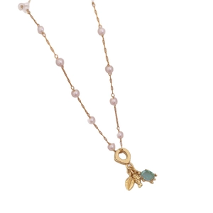 Golden sea turtle and shell pearl necklace with blue gemstone pendant for women
