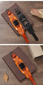 Detail of vintage Viking compass embossed leather bands for Apple Watch in brown and black