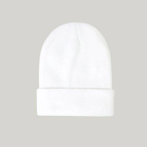 Detailed close-up of the fine knit texture on a classic white winter beanie hat