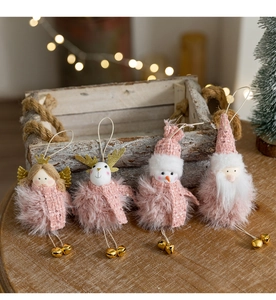 Pink plush Christmas dolls with reindeer and snowman designs and small metal bells