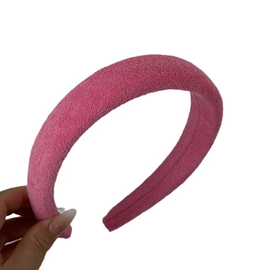Pink towel fabric sponge headband with high-top design and soft texture for women