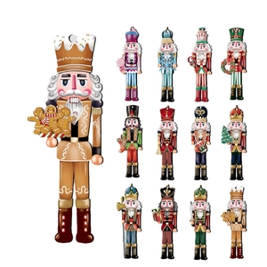 Detailed view of nutcracker Christmas tree ornaments with colorful gingerbread theme prints