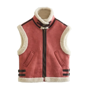 Pink faux suede vest with brown leather trim and warm fleece lining shown on white background