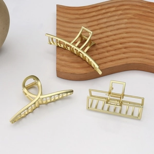Matte gold metal hair claw clips with pearls and rhinestones in three elegant styles