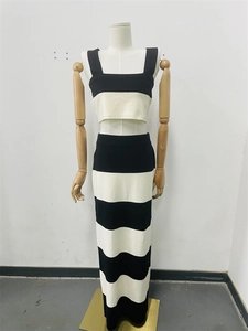Detail view of black and white striped knit fabric and texture on slim maxi skirt set