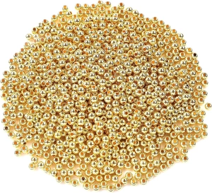 Macro shot of loose gold spacer beads for jewelry making with shiny metallic finish