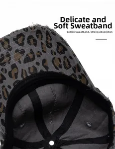 Detail shot of black cotton sweatband and premium stitching inside the leopard baseball cap