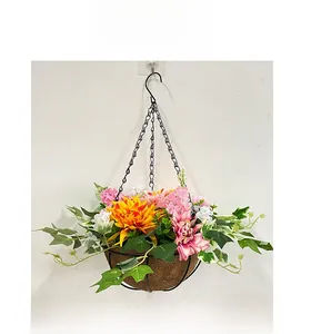 Detail of colorful artificial hanging flower basket with iron frame and coconut liner