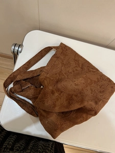 Vintage brown tote bag with intricate floral paisley embroidery in high-quality suede