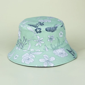 Close-up of mint green bucket hat with hand-painted floral print and stitched brim