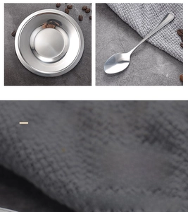 Close-up of polished 304 stainless steel coffee spoon and saucer set with curved handle