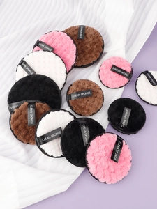 Close-up of colorful microfiber makeup sponges with CLEAN SPONGE ribbon hand straps