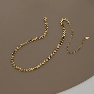 Detail of 18K gold plated wheat ear choker with adjustable chain and lobster clasp