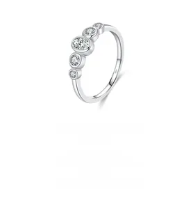 Macro shot of S925 sterling silver geometric ring with five sparkling cubic zirconia stones