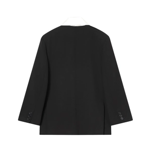 Blazer noir pour femme avec col écharpe blanc contrastant et boutons aux manches vue de dos