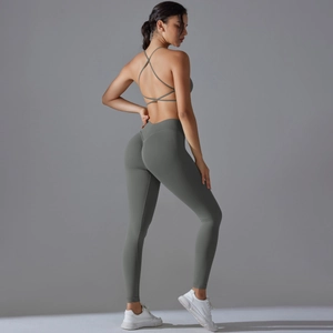 Detail view of seamless yoga set featuring a cross-back sports bra and high-waist leggings