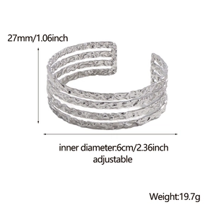 Detailed size map of silver irregular textured open bangle showing 27mm height and weight