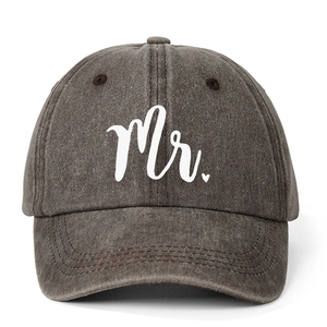 Detail of Mr. text and heart embroidery on a vintage grey washed cotton baseball cap
