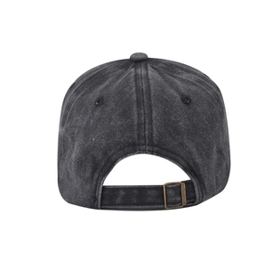 Detail of washed black baseball cap with adjustable metal buckle and retro fabric strap