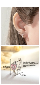 Detailed view of pink heart earrings showing 1.06cm height and 1.14cm width dimensions