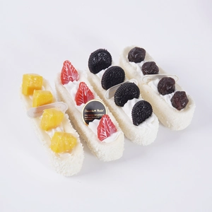 Realistic long-strip PU foam cake models with fruit toppings and cream deco