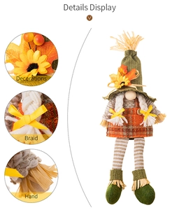 Detail display of sunflower and maple leaf ornaments on a straw hat gnome doll
