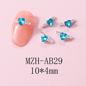 Detailed macro view of sea blue heart crystals for nail art sized 10x4mm and 5 pieces