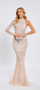 Close-up of sparkling rhinestones on sheer mesh fabric of an apricot fishtail dress