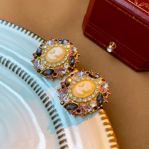 Vintage gold plated floral stud earrings with cameo and purple rhinestones for women