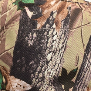 Macro detail of the bionic camouflage fabric showing durable texture for outdoor hats