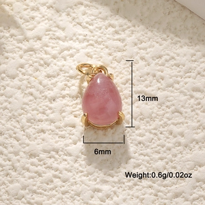 Macro shot of 13mm pink gemstone drop pendant with 18K gold plated copper base