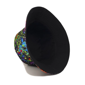 Double-sided bucket hat with vibrant colorful graffiti splatter print and black lining