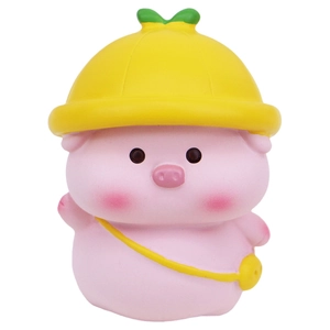 Cute pink pig figurine with yellow hat and crossbody bag for car dashboard or desk