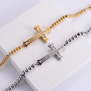 Minimalist titanium steel beaded bracelet with sparkling cross pendant in gold and silver