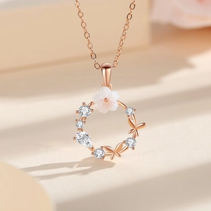 Elegant S925 silver necklace with rose gold butterfly floral wreath pendant and diamonds