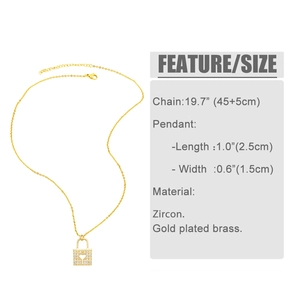 Macro shot of gold-plated heart lock pendant with zircon settings and chain measurements