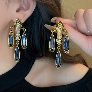 Vintage water drop earrings with blue crystals and antique gold finish for women
