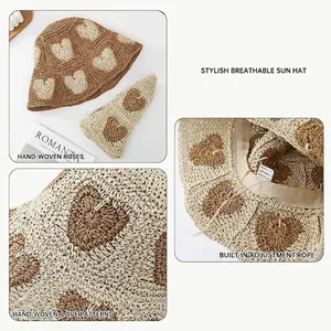 Foldable straw sun hat with heart pattern, handmade woven design for beach travel