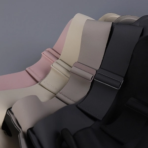 Macro view of adjustable seamless elastic straps in multiple colors with matte buckles