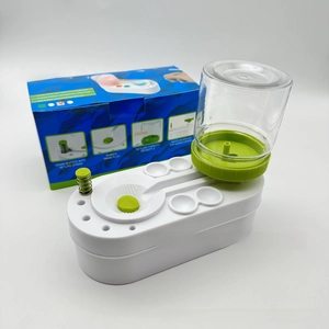Detail of water cycle brush cleaner with 250ml reservoir bottle and green drain button