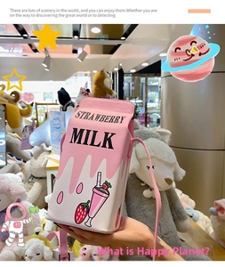 Detail of pink strawberry milk carton crossbody bag with adjustable shoulder strap