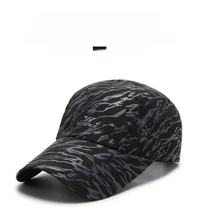 Close-up of camouflage baseball cap fabric with SDSRUI logo and breathable mesh details
