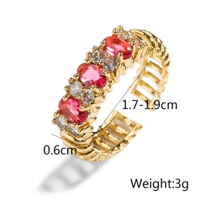 Macro detail of 18K gold plated ring with red and white zircon inlays and dimensions