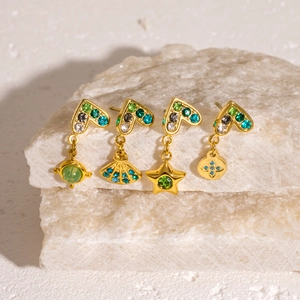 Gold stainless steel stud earring set with star and starburst charms and colorful crystals