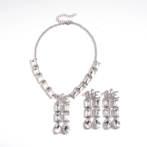 Luxury silver geometric necklace and drop earrings set with crystals and C-logo