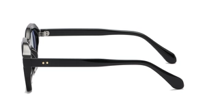Detail of polygon sunglasses with black frames, blue lenses, and golden metal dots