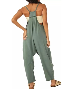 Detailed back view of sage green overalls featuring a zipper pocket and loose drop-crotch fit